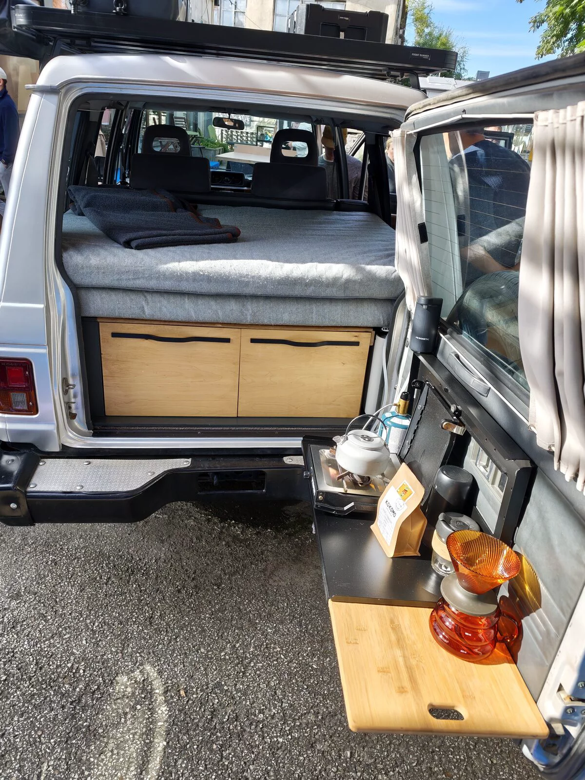 Pajero rear door: sleeping platform and slide-out kitchen