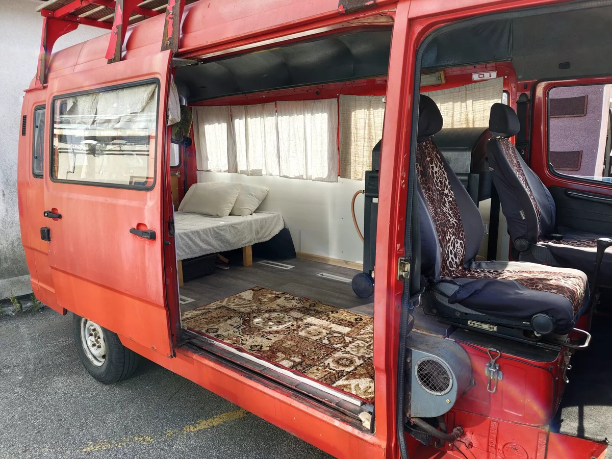 Red van with a carpet and leopard-print seats