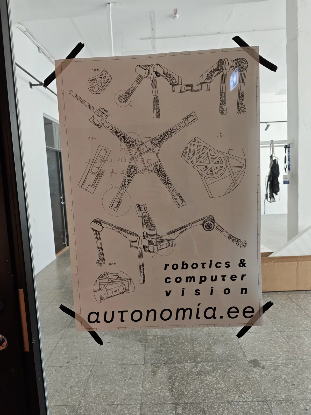 Постер autonomia.ee - robotics & computer vision на двери лаборатории